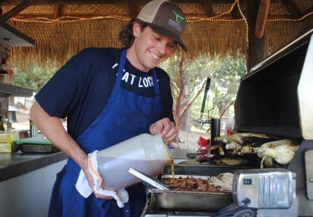 Chef Jeremy Manley prepares a pork fest at the Cook Pigs Ranch